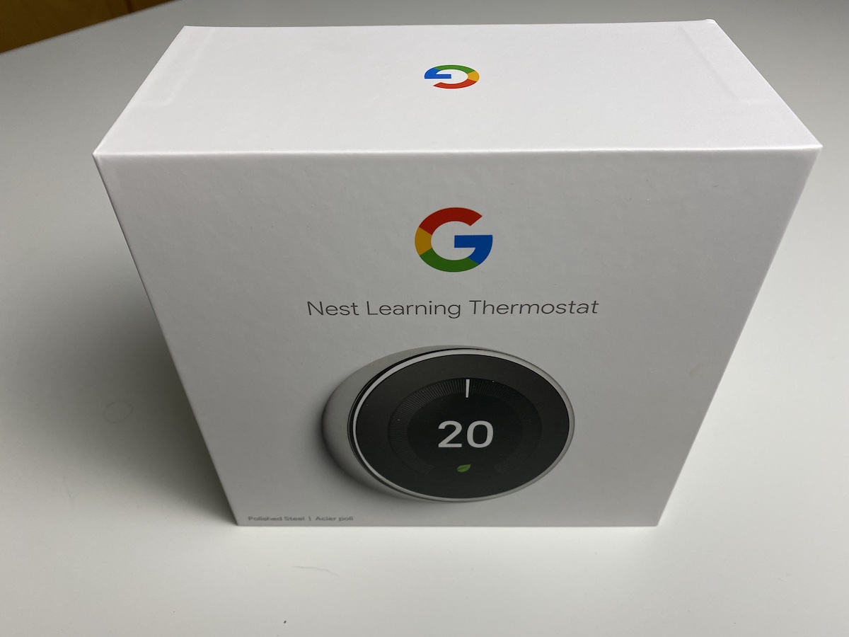 A 3rd Generation Nest Thermostat box on a white table