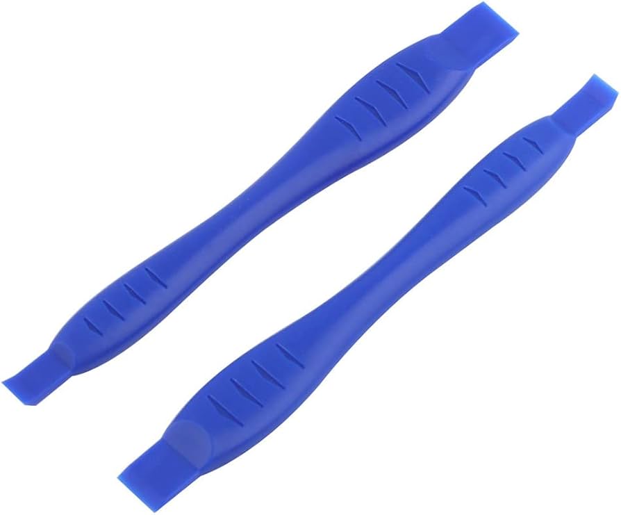 blue spudger kept on white background