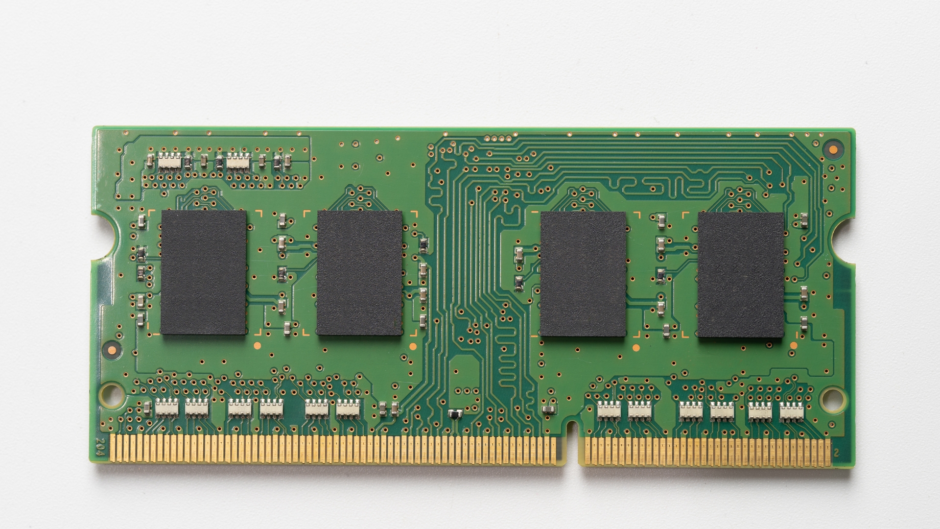 green ddr4 ram kept on a table