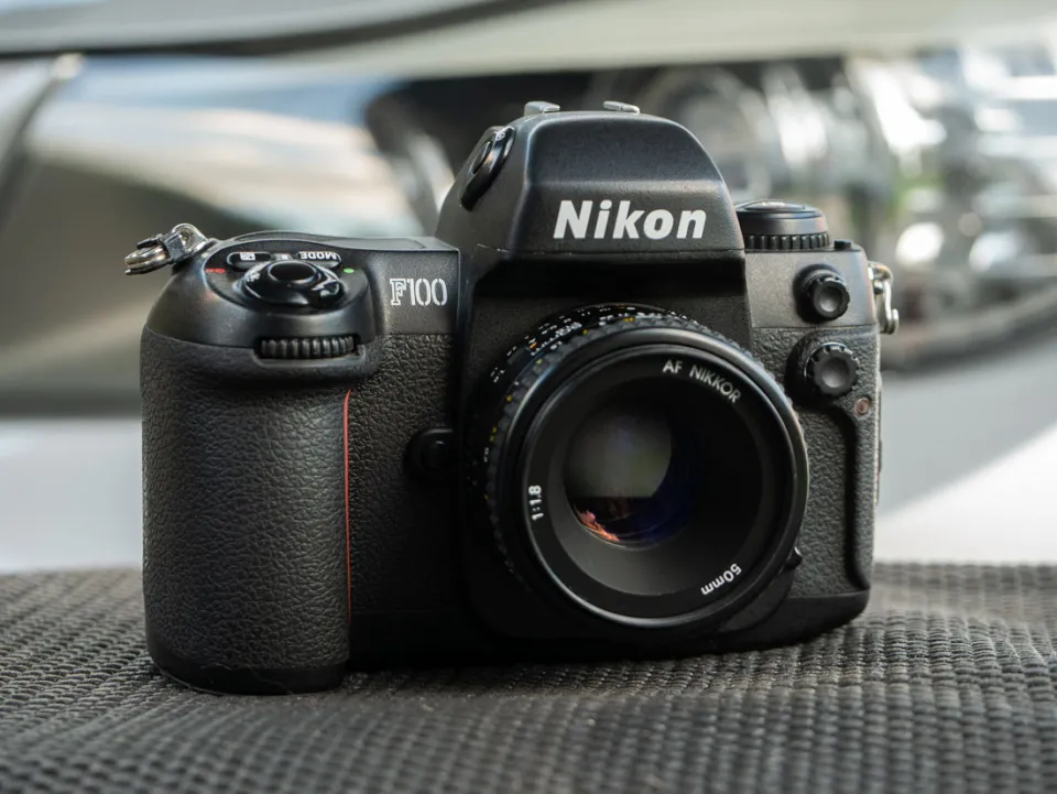 Nikon F100 camera on table