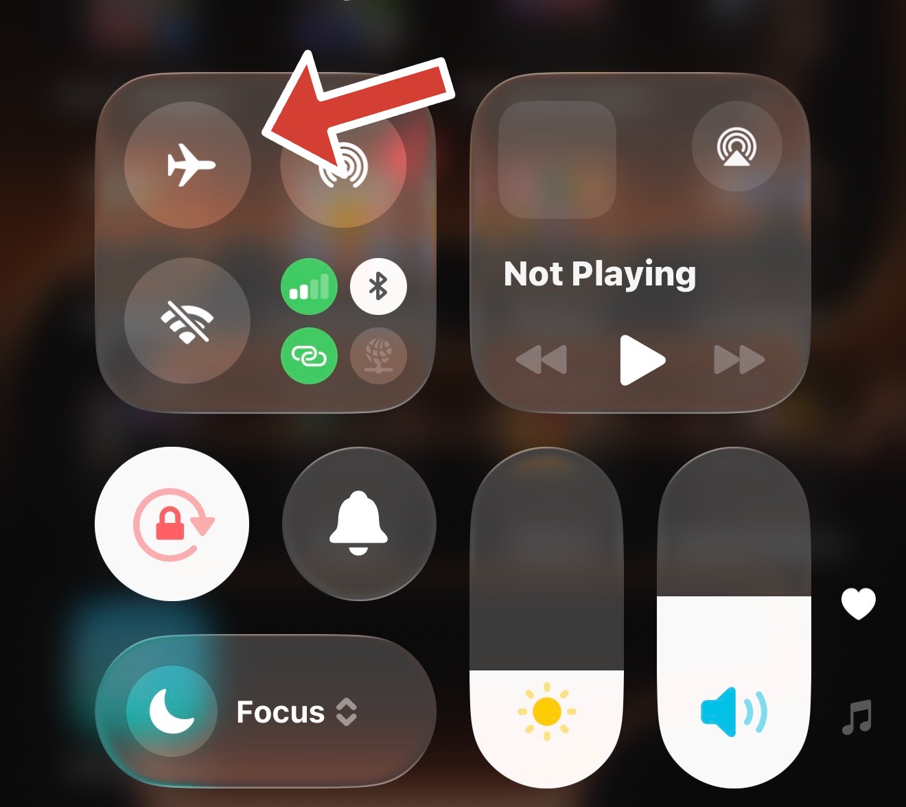 User toggling Airplane Mode in iPhone Control Center