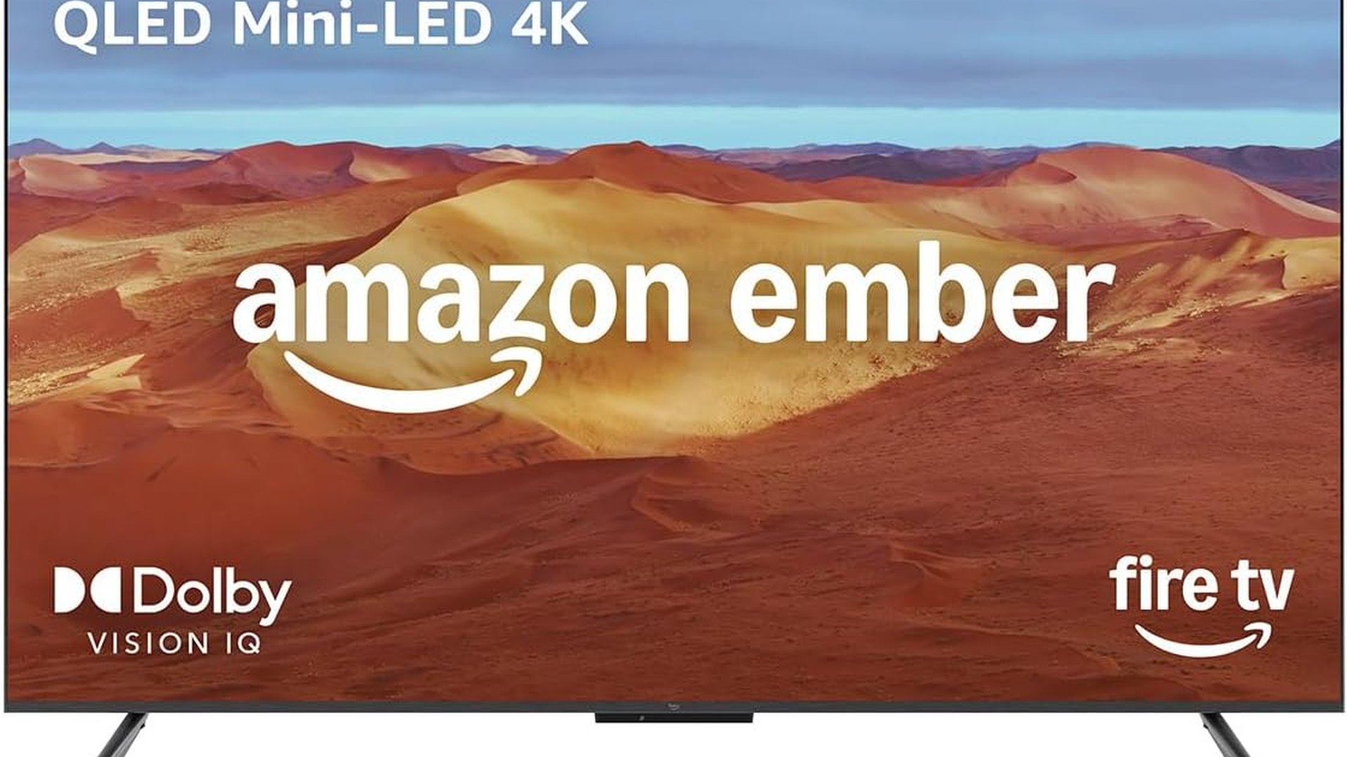 Amazon Ember 75-inch Mini-LED Series TV on a stand showing a desert dune landscape