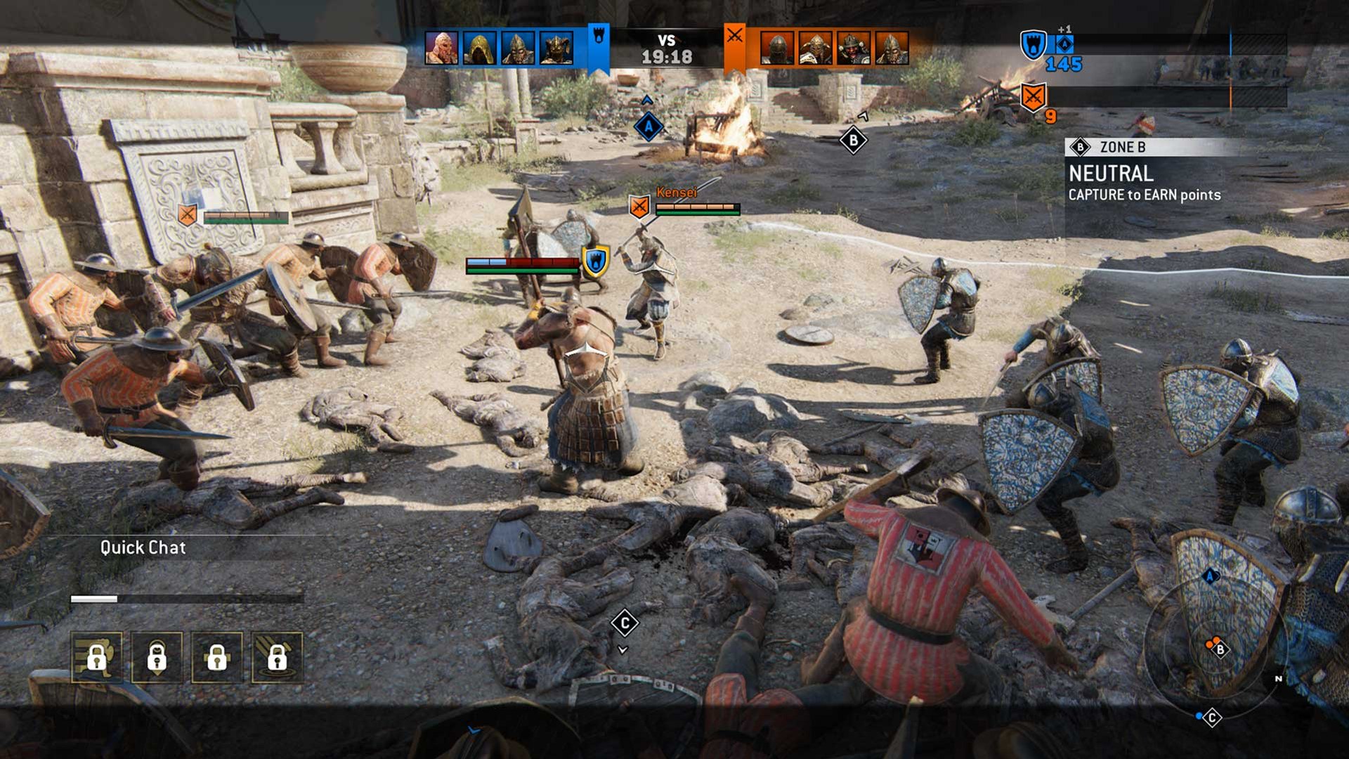 Armored soldiers fighting over a capture zone in For Honor Dominion mode