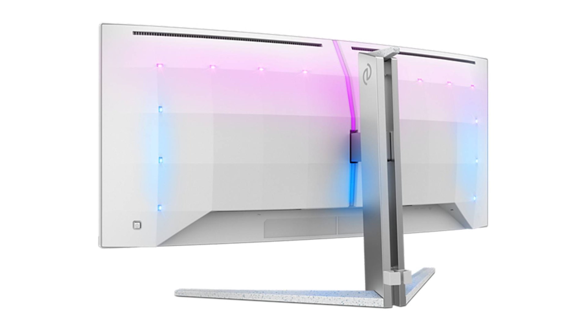 Rear of a curved monitor casting colored light on the wall behind it