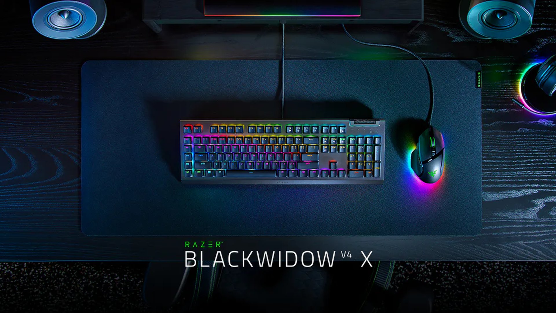 Razer BlackWidow V4 X keyboard and mouse on a desk mat