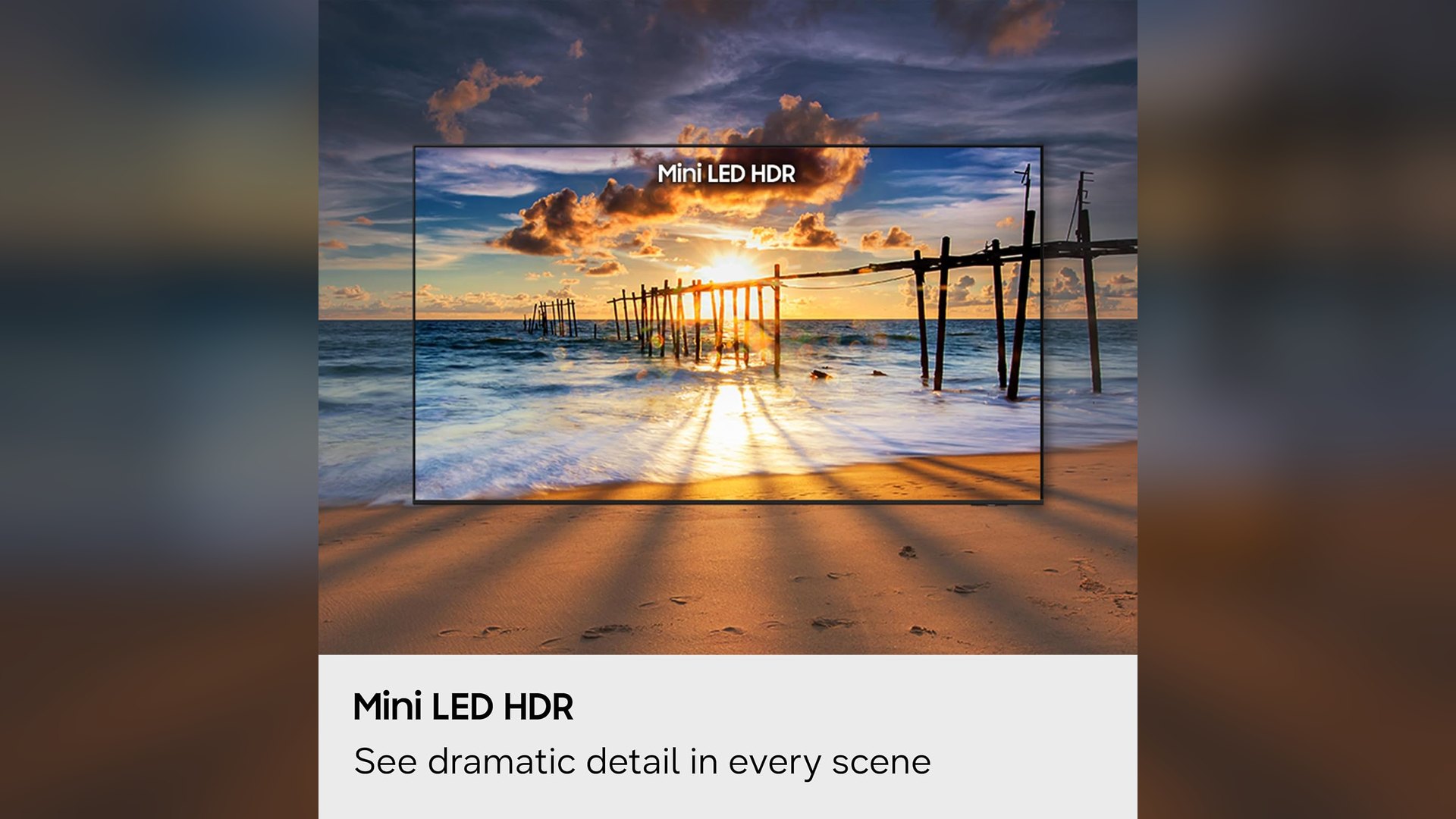 Sunset pier scene displayed on the Samsung M70H under a Mini LED HDR caption