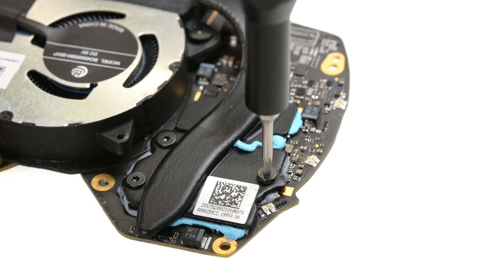 Cooling fan and heat pipe exposed inside a disassembled Steam Frame headset