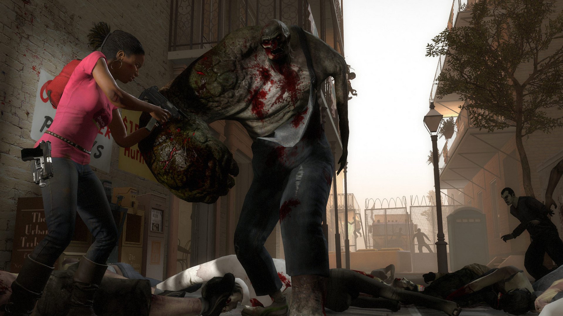 Left 4 Dead 2 gameplay screenshot showing survivors fighting a horde