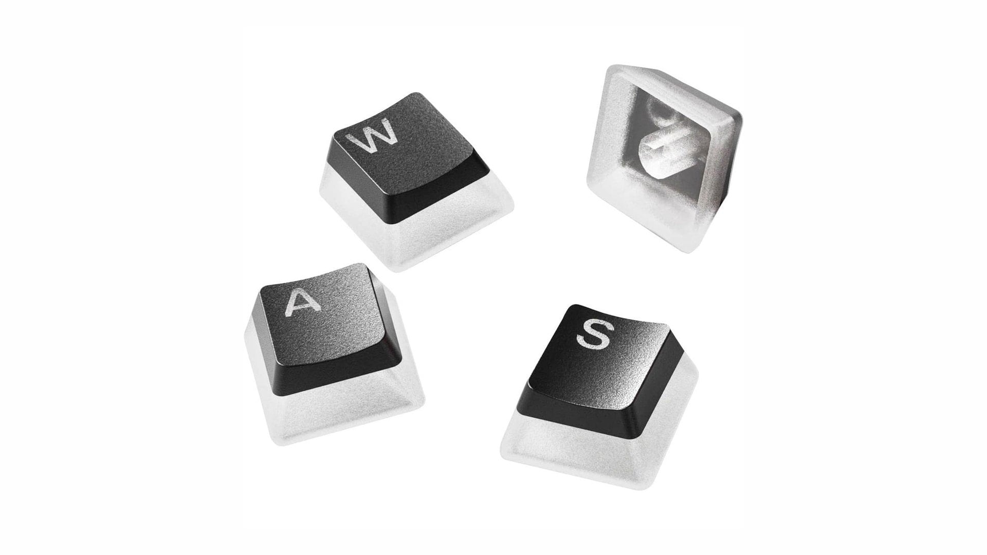 Four black keycaps with translucent sides, one upside down