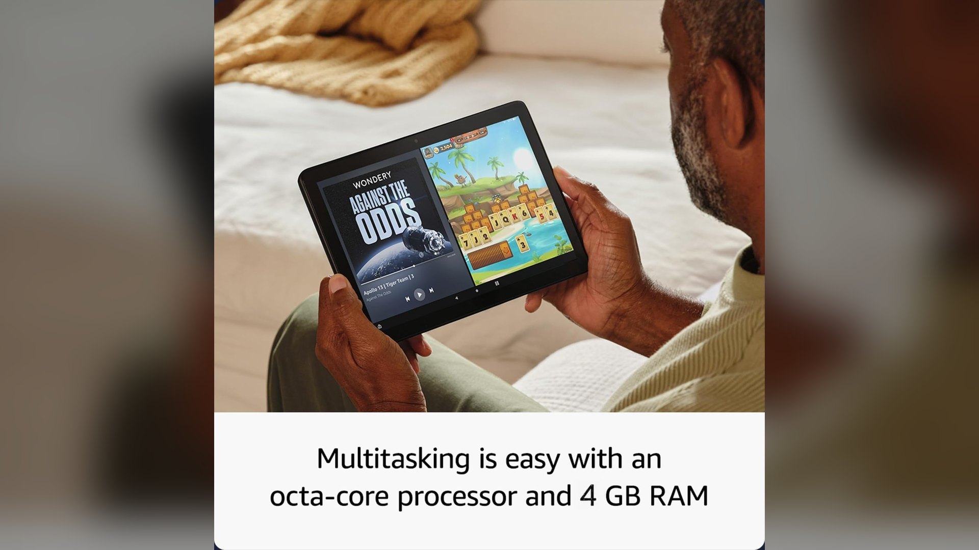 Hands holding the Fire HD 10 in landscape with two apps open