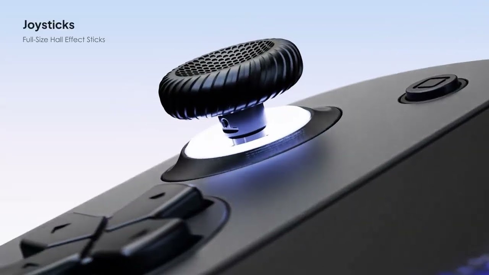 Close-up of an Odin 3 Portal joystick with a lit ring around its base