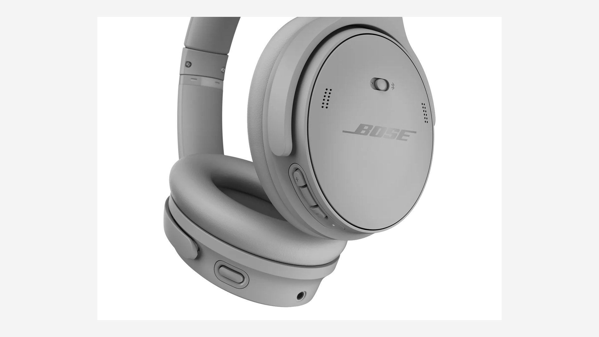 Close-up of one grey earcup with the Bose logo