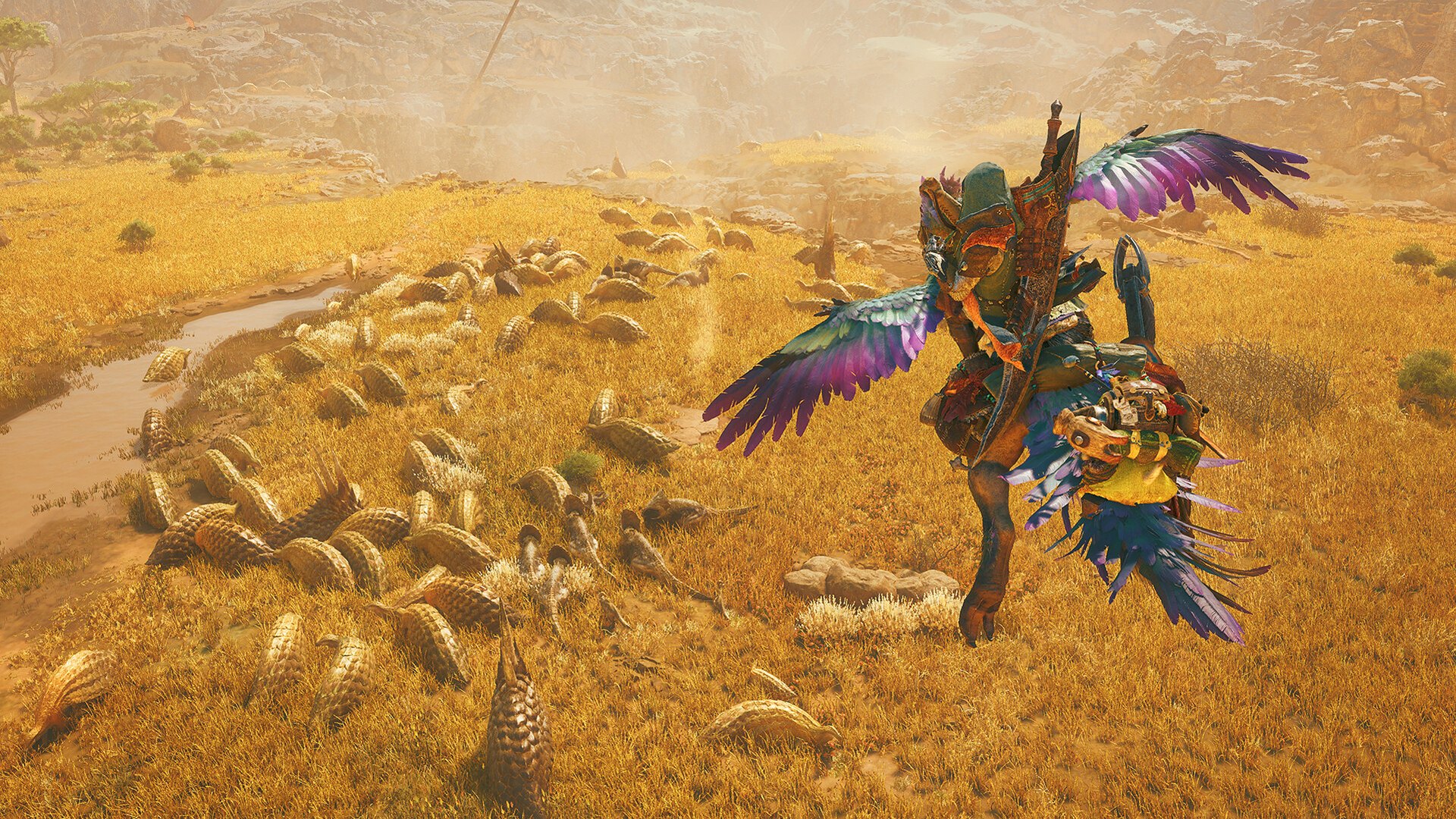 Hunter riding a mount through a wide golden plain in Monster Hunter Wilds