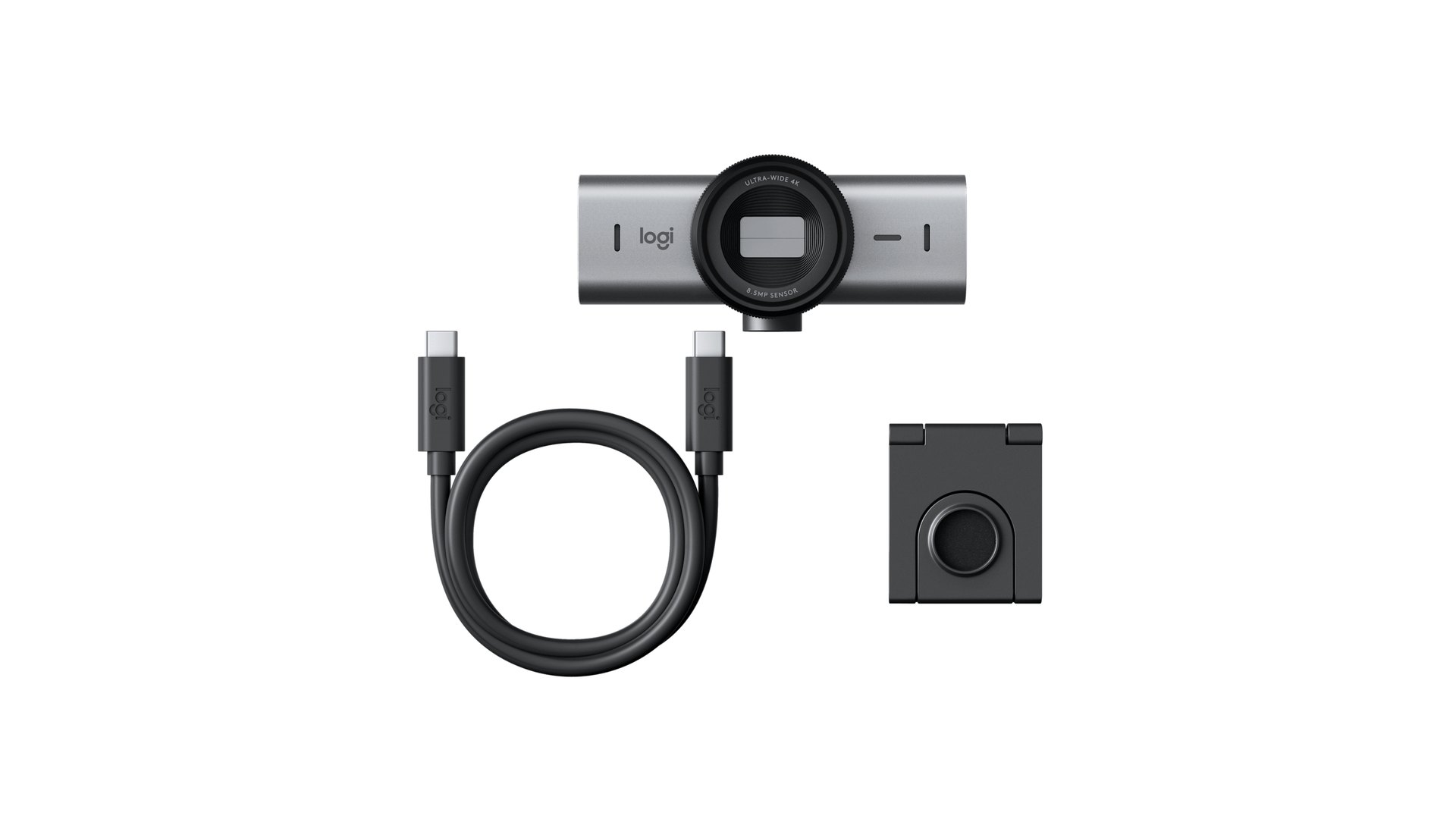Logitech MX Brio webcam beside a USB-C cable and a mounting clip