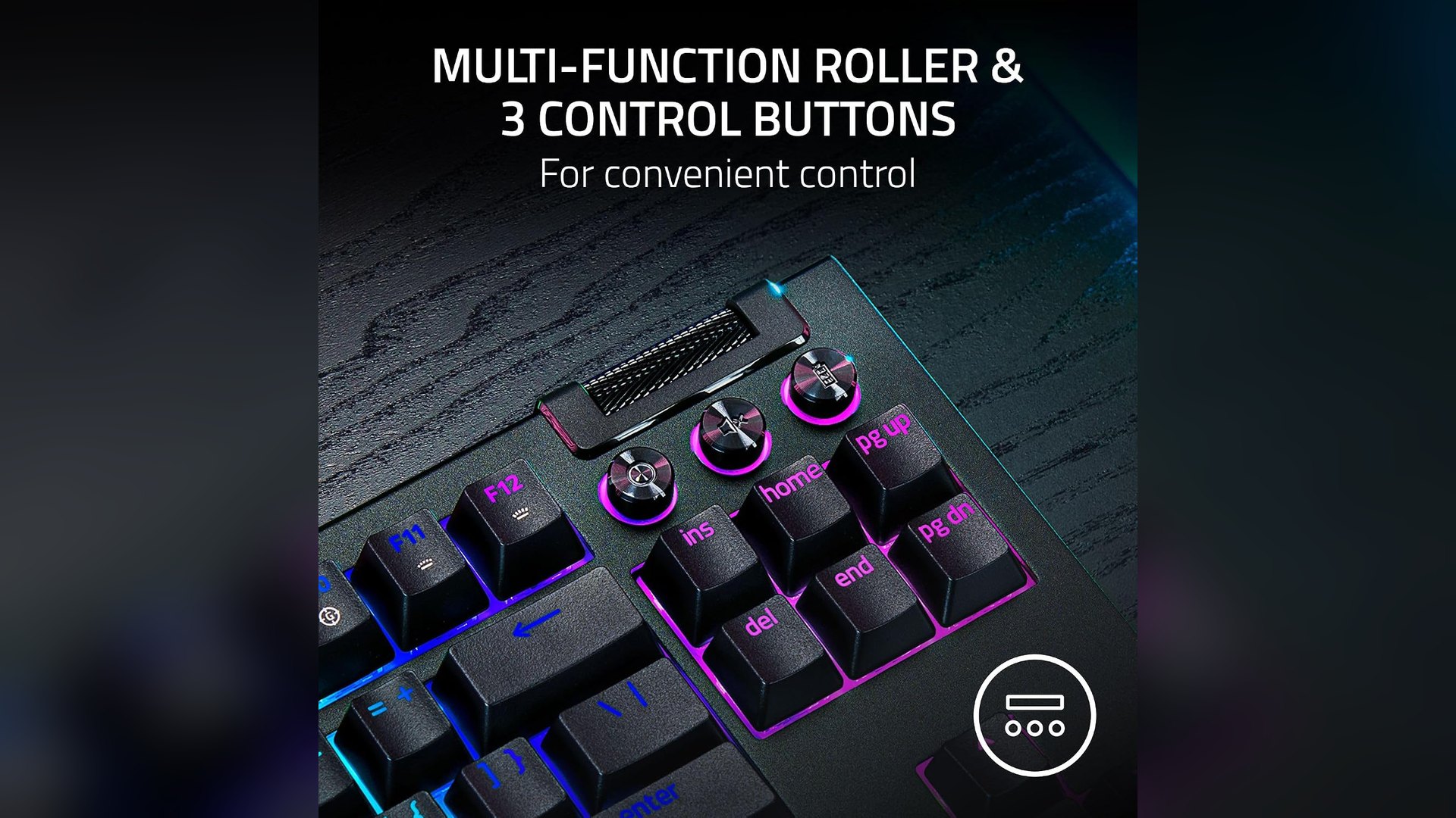 Close view of the multi-function roller and three control buttons on the keyboard