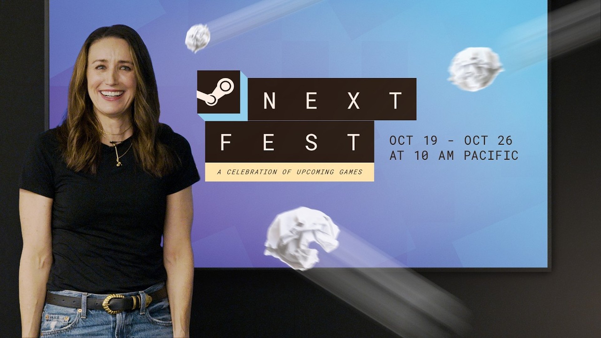Presenter standing beside a Steam Next Fest card in Valve's tour video