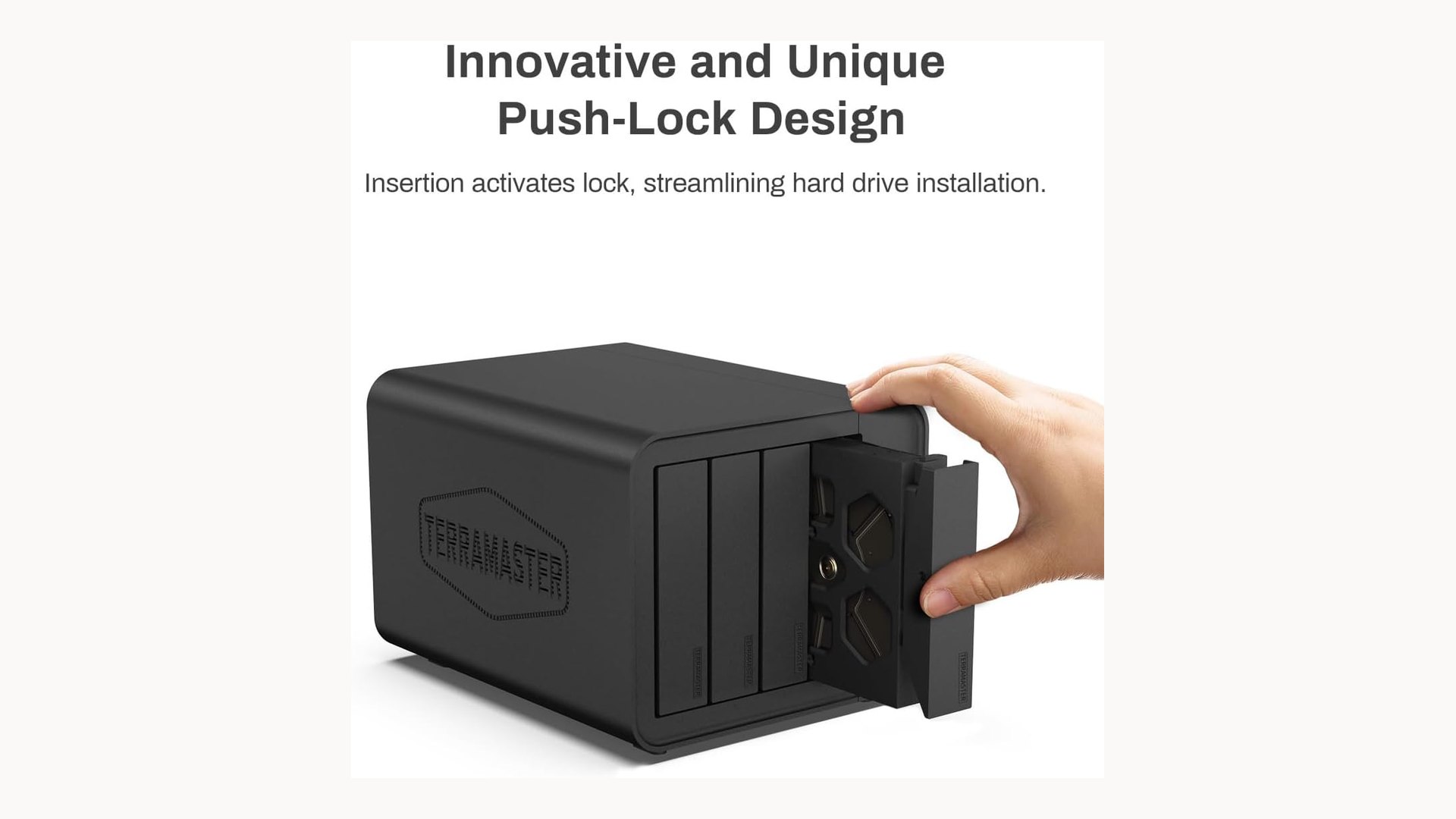Hand inserting a black drive tray into the TerraMaster D4-320 enclosure