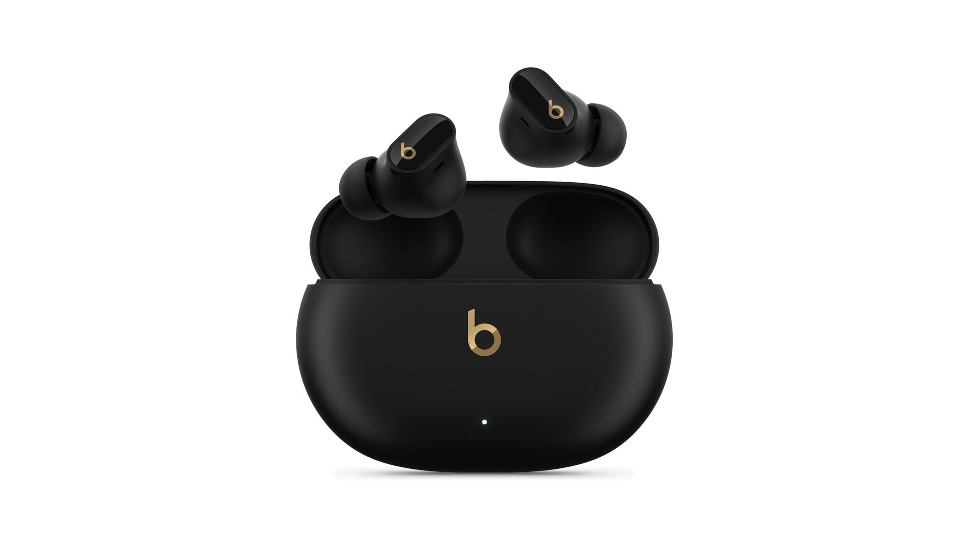 Open black and gold Beats Studio Buds plus charging case with both earbuds above it